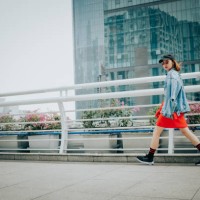 portrait of walking overpass fashion asian woman in city street - fashion stock pictures, royalty-free photos & images