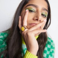 portrait of woman looking defiantly at camera - fashion stock pictures, royalty-free photos & images