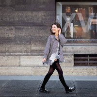 portrait of woman walking on the street and wind blowing her skirt - fashion stock pictures, royalty-free photos & images
