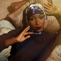 portrait of woman wearing traditional clothing while sitting on pillows and looking at camera,lagos,nigeria - fashion stock pictures, royalty-free photos & images
