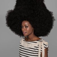 portrait of woman with very large afro - hairstyle stock pictures, royalty-free photos & images