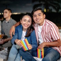 portrait of young couple at the outdoors cinema - concert stock pictures, royalty-free photos & images