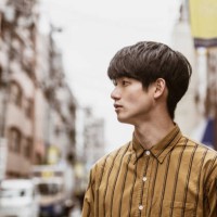 portrait of young japanese man wearing striped shirt - fashion stock pictures, royalty-free photos & images