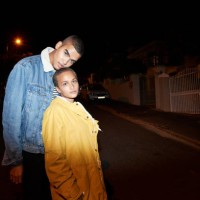 portrait of young man and woman standing on street - fashion stock pictures, royalty-free photos & images