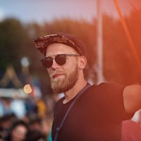 portrait of young man at music festival - concert stock pictures, royalty-free photos & images