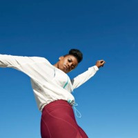 portrait of young sportswoman against clear blue sky - fashion stock pictures, royalty-free photos & images