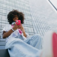 portrait of young stylish generation z girl taken from below. - fashion stock pictures, royalty-free photos & images