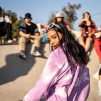 portrait of young woman dancing at street party - fashion stock pictures, royalty-free photos & images