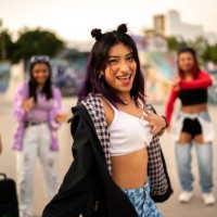 portrait of young woman dancing hip hop during street party with her friends - fashion stock pictures, royalty-free photos & images