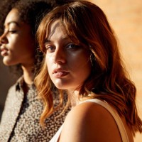 portrait of young woman in city - fashion stock pictures, royalty-free photos & images