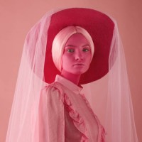 portrait of young woman in monochrome pink tones - fashion stock pictures, royalty-free photos & images