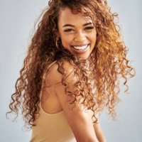 portrait, smile and hair beauty with black woman on a studio gray background. happy girl fashion model, curly hair and glowing skin after cosmetic spa treatment for wellness, skincare and hair care. - hairstyle stock pictures