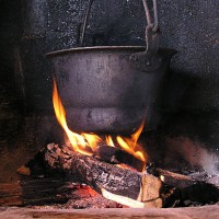 pot on a fire - food stockfoto's en -beelden