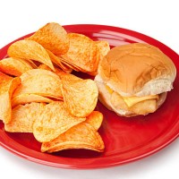 pototo chips and fish sandwich meal or unhealthy eating - junk food stock pictures, royalty-free photos & images