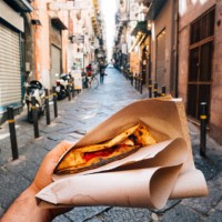 pov view of a man eating a typical 