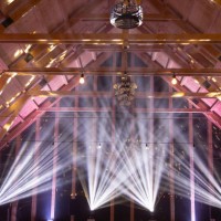 powerful moving light beams on the ceiling structure in the interior of a public event, fashion show, concert or wedding reception. - concert stock pictures, royalty-free photos & images