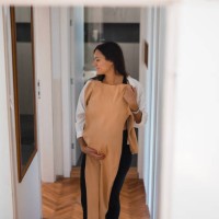 pregnant woman trying on maternity clothes - fashion stock pictures, royalty-free photos & images