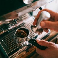 preparing an espresso at home - coffee stockfoto's en -beelden