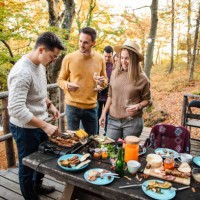 preparing food outdoors together - food stock pictures, royalty-free photos & images