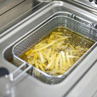 preparing french fries - junk food stock pictures, royalty-free photos & images
