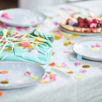 present on table, decorated with confetti - home decoration stock pictures, royalty-free photos & images