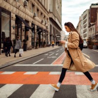 pretty woman crossing the street - fashion stock pictures, royalty-free photos & images