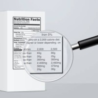 product box with nutrition facts label and magnifying lens - junk food stock illustrations