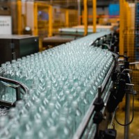 production line for juice bottling - food stock pictures, royalty-free photos & images