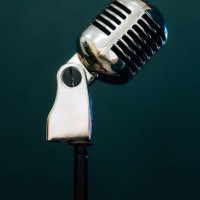 professional microphone on a black background. karaoke. recording a podcast. voice acting. blogger. asmr. - concert stock pictures, royalty-free photos & images