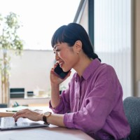 professional woman engaged in business call at modern office - home decoration stock pictures, royalty-free photos & images