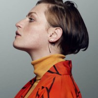 profile portrait of beautiful young woman looking in camera, shot on studio - fashion stock pictures, royalty-free photos & images