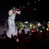 Puerto Rican rapper Bad Bunny performs on stage as part of his three-day "Un Verano Sin Ti" concert at the Coliseo de Puerto Rico in San Juan, Puerto...