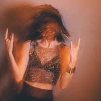 punk rocker chick, punk rock girl making rock hands sign - fashion stock pictures, royalty-free photos & images