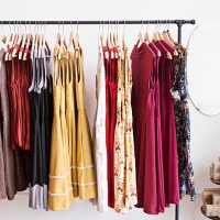 rack of dresses in boutique - fashion stock pictures, royalty-free photos & images