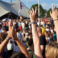 raised clapping hands at concert with big crowd - concert stock pictures, royalty-free photos & images