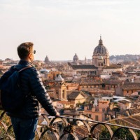 rear view of a man looking at rome skyline from above, italy - travel stock pictures, royalty-free photos & images