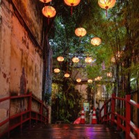 red bridge entrance to kwai chai hong laneway, lorong panggung, chinatown, kuala lumpur maylasia. - garden decoration stock pictures, royalty-free photos & images