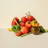 red,green tomatoes, carrots and green beans on the beige background - food stock pictures, royalty-free photos & images