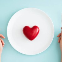 red heart on white plate - food stock pictures, royalty-free photos & images