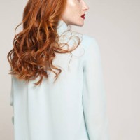 redhead woman in blue blouse - fashion stock pictures, royalty-free photos & images