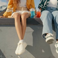 relax, shoes and summer with friends at skate park for bonding, calm and hipster. cheers, mockup and teenager with closeup of people in outdoors for skating, fitness and sports training together - fashion stock pictures, roya