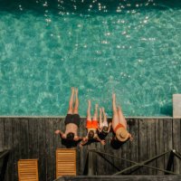relaxing by the pool - travel stock pictures, royalty-free photos & images