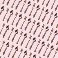 repeated spoon and fork on the pink background - food stock pictures, royalty-free photos & images