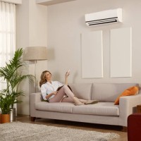 resting in a room with air conditioner - home decoration stock pictures, royalty-free photos & images
