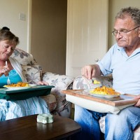 retirement: eating in - junk food stock pictures, royalty-free photos & images