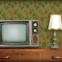 retro living room with a tv and a lamp atop a wooden desk - home decoration stock pictures, royalty-free photos & images
