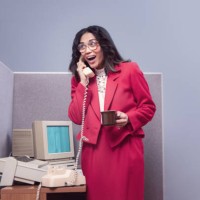 retro office worker on phone at computer cubicle - fashion stock pictures, royalty-free photos & images
