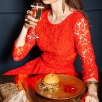 rich woman drinking champagne and eating fast food - junk food stock pictures, royalty-free photos & images