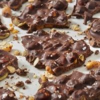 roasted chick pea and pumpkin seed chocolate bark - junk food stock pictures, royalty-free photos & images