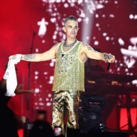 Robbie Williams performs on stage during Heritage Live 2023 at Royal Sandringham Estate on August 26, 2023 in Sandringham, Norfolk.